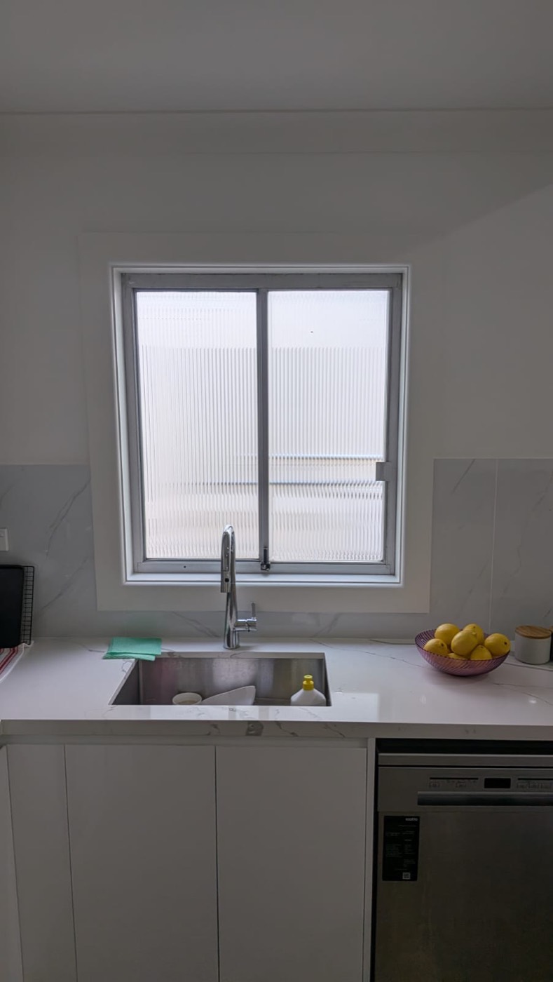 Decorative window film installation by TintCo