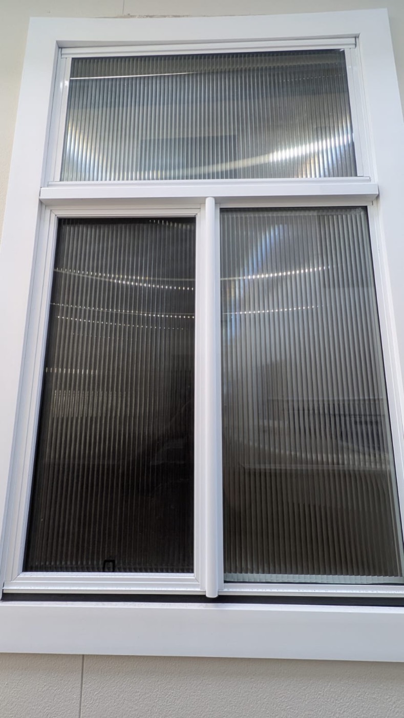Decorative window film installation by TintCo