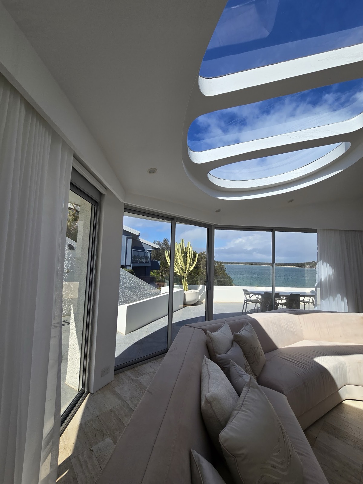 Luxury Sydney home with curved glass and premium window tinting